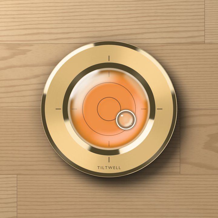 Brass skin round level with amber liquid